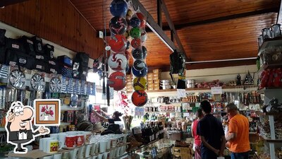 Sente em uma das mesas no Rei da Bisteca