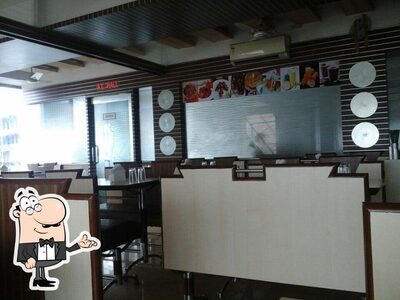 Take a seat at one of the tables at Hotel Crossway