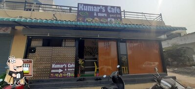 Enjoy the view at the outside area of Kumar's Cafe & more