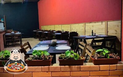 No Tchelos pizzaria, você pode conseguir pizza