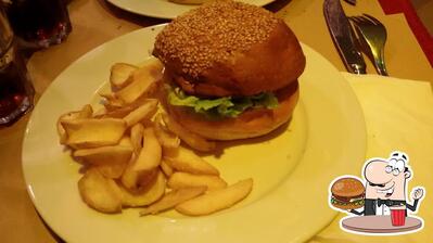 Concediti un bell'hamburger al pub & bar Rik's Cafe Restaurant Roma