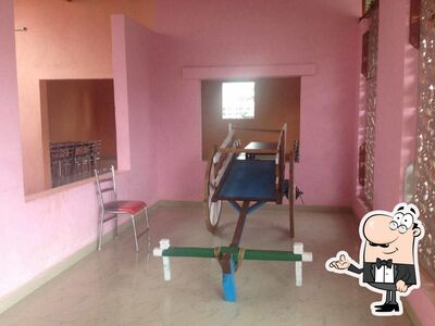 The interior of Friends Lodging & Boarding, Deluxe Rooms Hotel Near Bangalore Airport Road, Attached Family Restaurant in Devanahalli Road