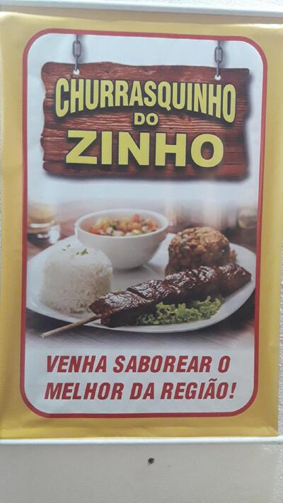 A publicidade mostra informações sobre o Churrsquinho do Zinho
