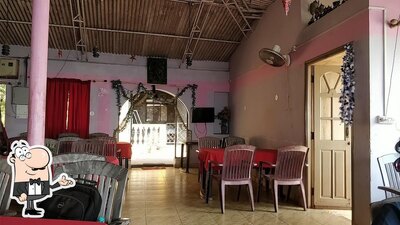 Take a seat at one of the tables at Goan Delicacy
