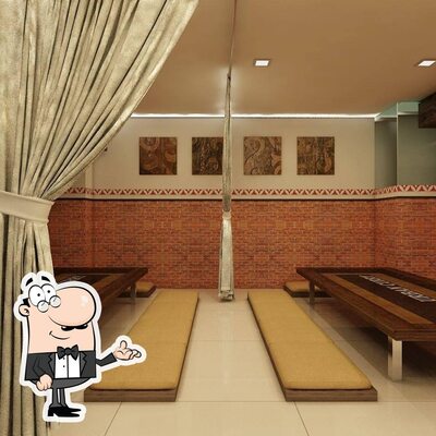 Take a seat at one of the tables at Cafe Urban Curry