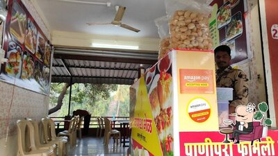 Take a seat at one of the tables at Ganesh Bhel