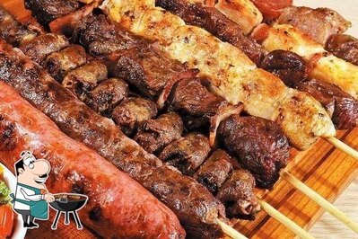 Experimente pratos de carne do menu