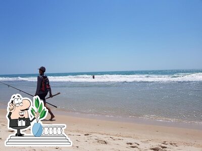 Você pode espairecer no na área externa do Barraca Estrela Do Mar