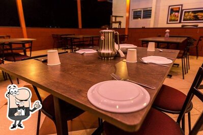 Take a seat at one of the tables at Annapoorna Aahar