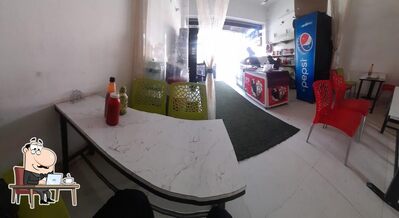 Take a seat at one of the tables at Neelkanth snacks