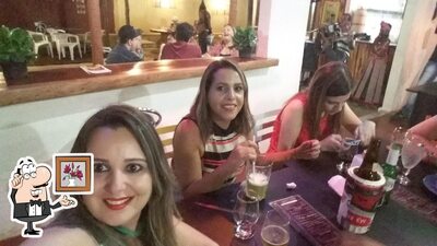Sente em uma das mesas no Restaurante Mandala - Tempero & Afeto