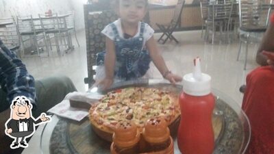 The interior of Dominic's Pizza - Best Pizza Restaurants in Sudhar