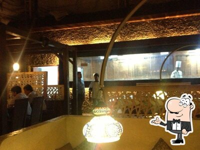 Take a seat at one of the tables at Sky Sheesha Lounge