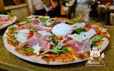 A Grande Roma Baldushk, vous pouvez déguster des pizzas