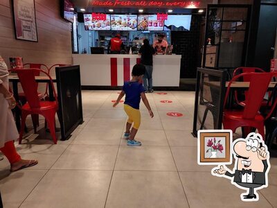 Take a seat at one of the tables at KFC